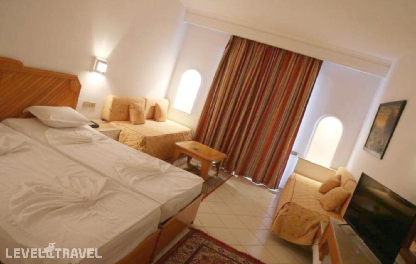 фотографии номера Стандартный номер отеля Golf Residence Hotel в Тунис(Порт Эль-Кантауи) - фото №3