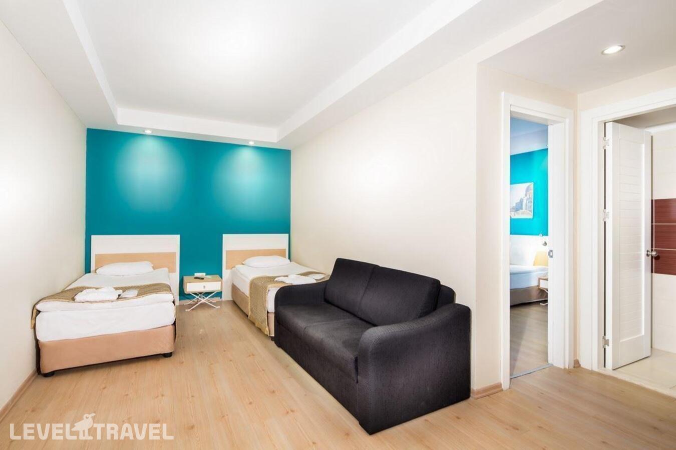 фотографии номера Семейный с видом на окрестности отеля Crystal Green Bay Resort & Spa в Турция(Гюверджинлик) - фото №2