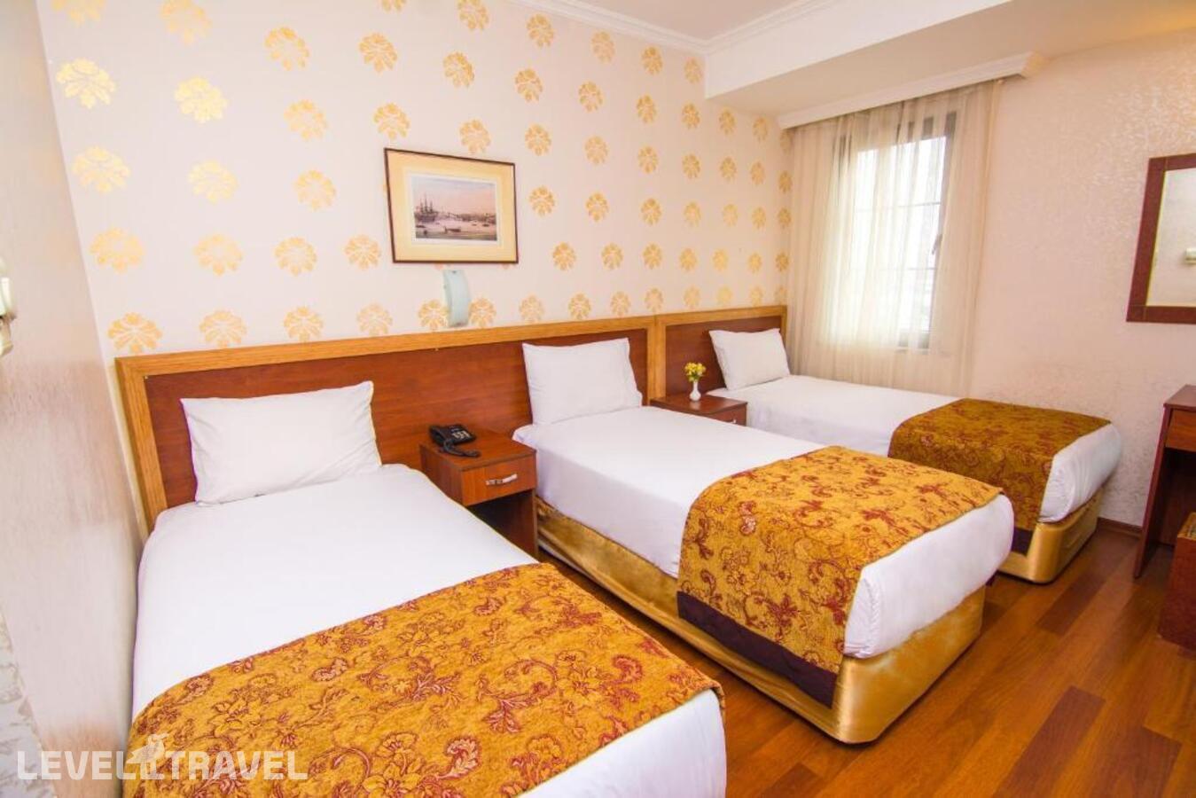 фотографии номера Четырехместный номер отеля Orient Mintur Hotel в Турция(Фатих) - фото №1