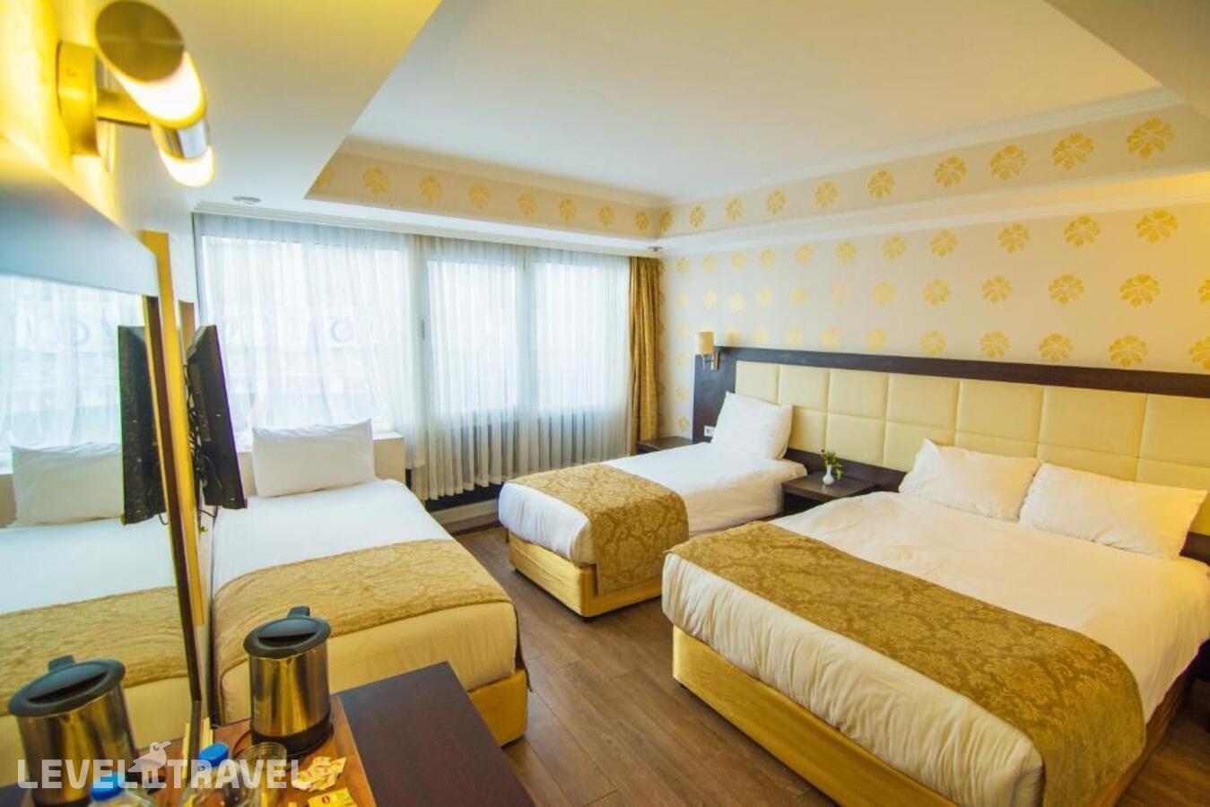 фотографии номера Четырехместный номер отеля Orient Mintur Hotel в Турция(Фатих) - фото №4