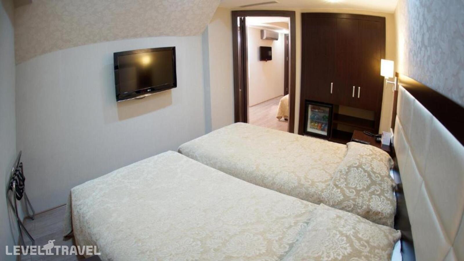 фотографии номера Четырехместный номер отеля Orient Mintur Hotel в Турция(Фатих) - фото №6