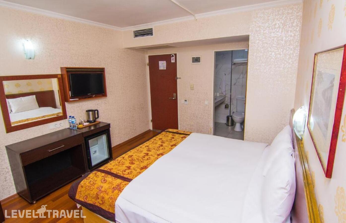 фотографии номера Четырехместный номер отеля Orient Mintur Hotel в Турция(Фатих) - фото №5