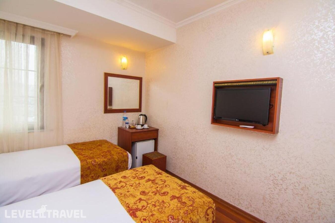 фотографии номера Четырехместный номер отеля Orient Mintur Hotel в Турция(Фатих) - фото №2