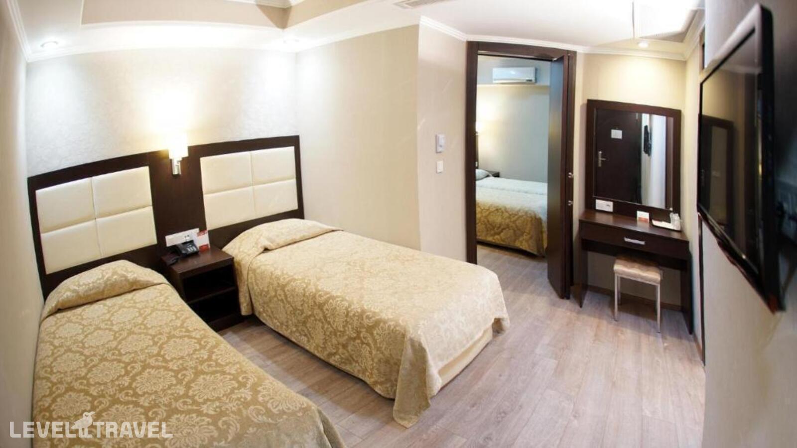фотографии номера Четырехместный номер отеля Orient Mintur Hotel в Турция(Фатих) - фото №7