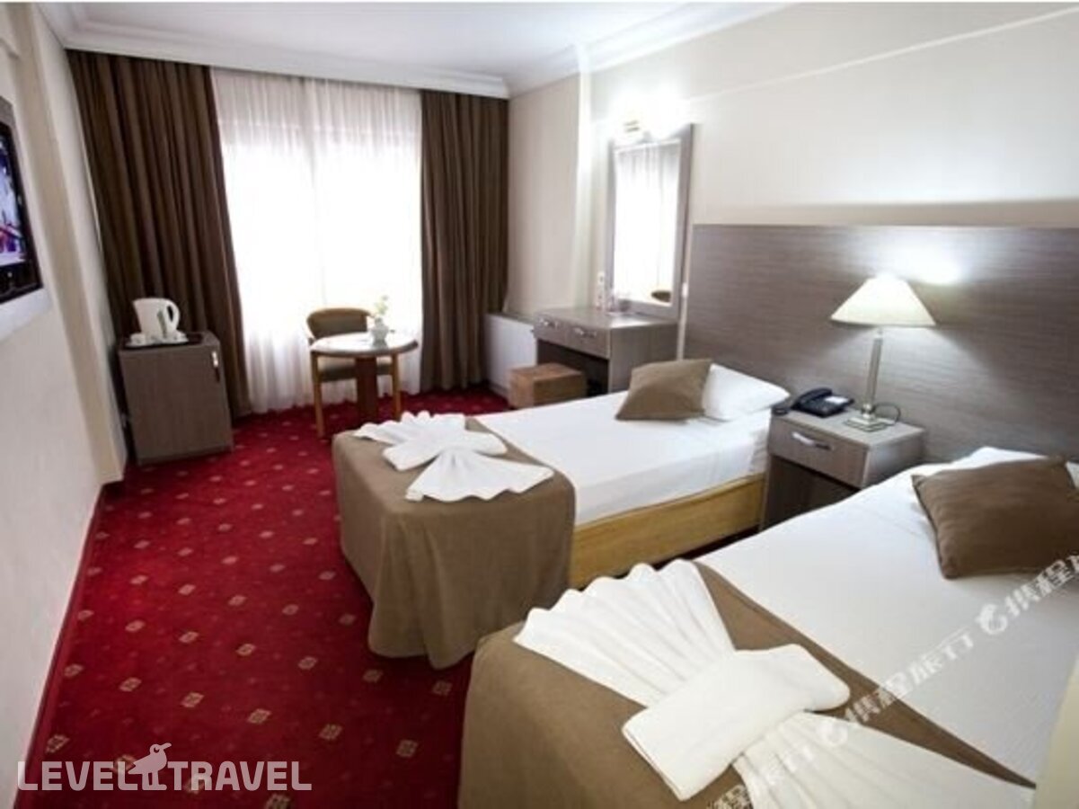 фотографии номера Трехместный номер отеля Buyuk Sahinler Hotel в Турция(Фатих) - фото №22