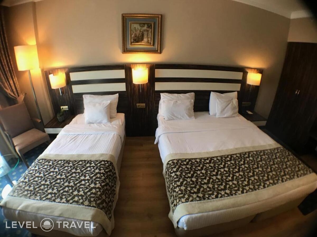 фотографии номера Трехместный номер отеля Akgun Hotel Beyazit в Турция(Фатих) - фото №3