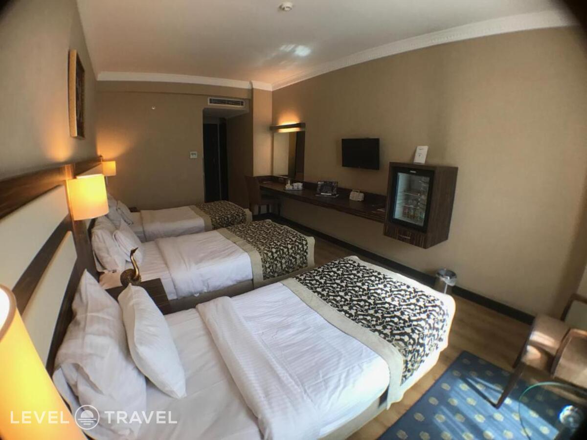 фотографии номера Трехместный номер отеля Akgun Hotel Beyazit в Турция(Фатих) - фото №7