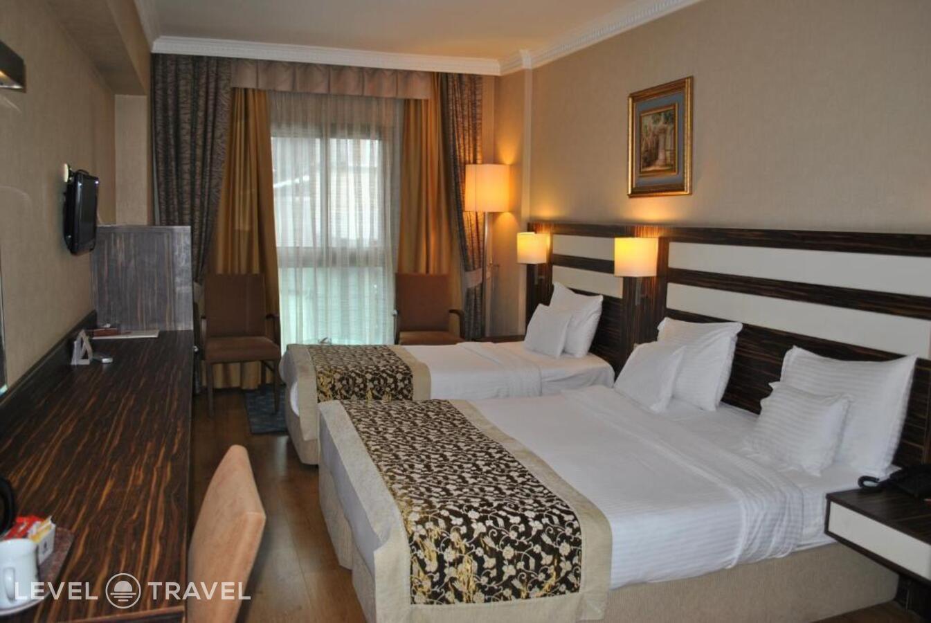 фотографии номера Трехместный номер отеля Akgun Hotel Beyazit в Турция(Фатих) - фото №9