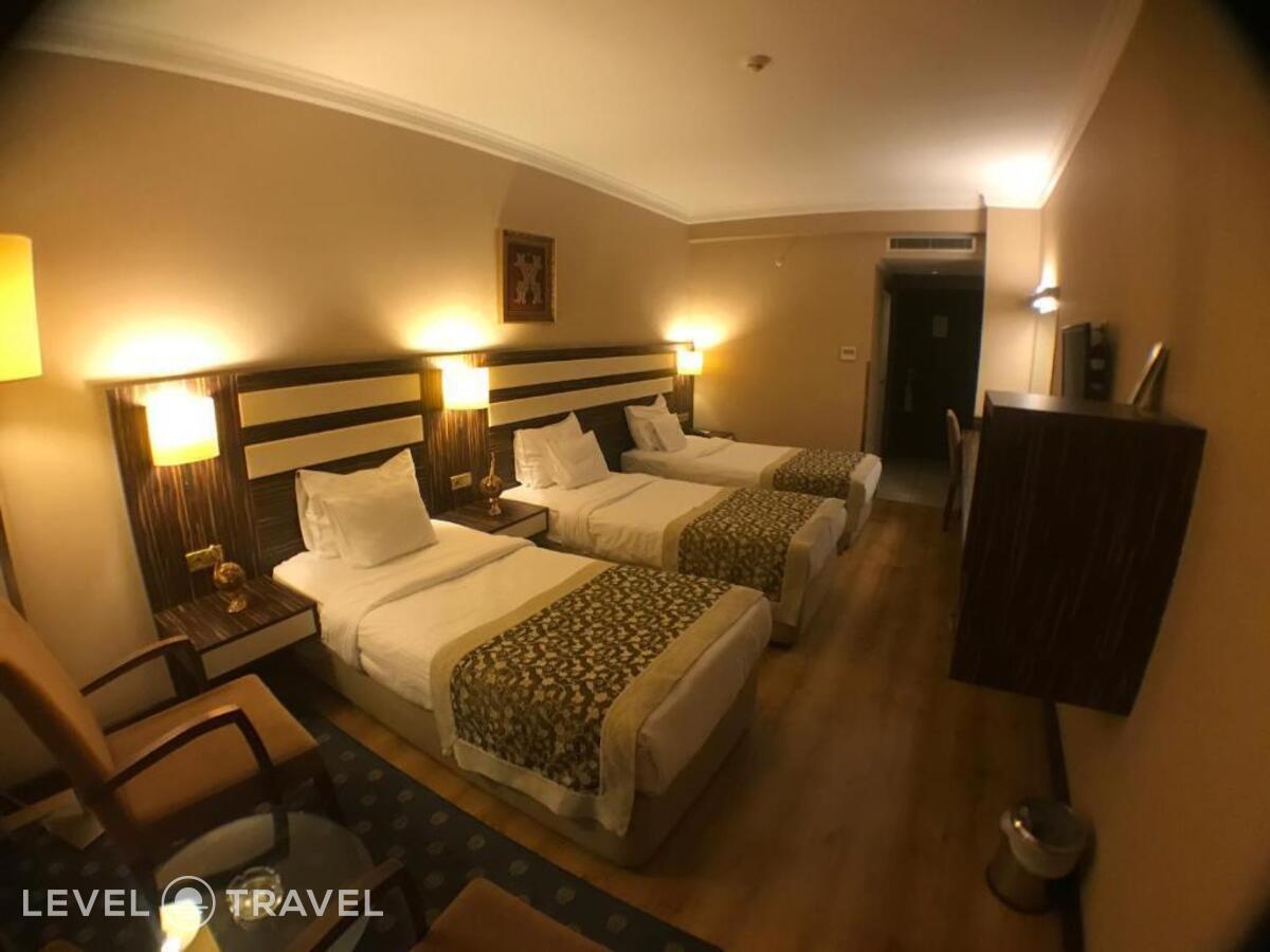 фотографии номера Трехместный номер отеля Akgun Hotel Beyazit в Турция(Фатих) - фото №1
