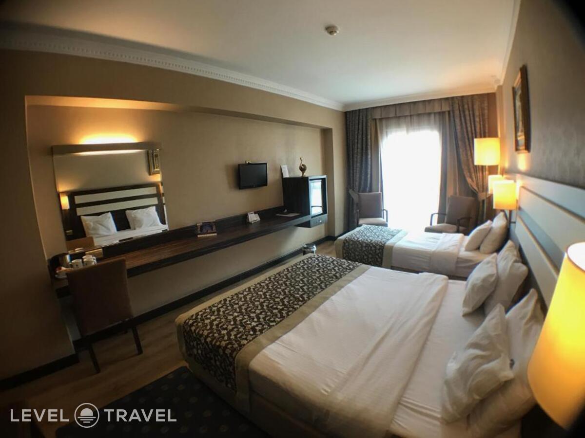 фотографии номера Трехместный номер отеля Akgun Hotel Beyazit в Турция(Фатих) - фото №5