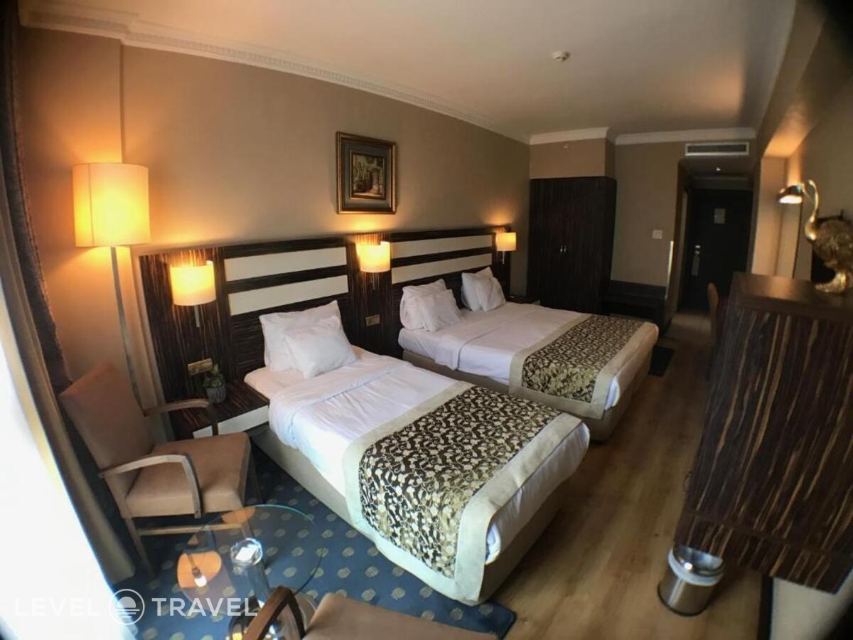 фотографии номера Трехместный номер отеля Akgun Hotel Beyazit в Турция(Фатих) - фото №4