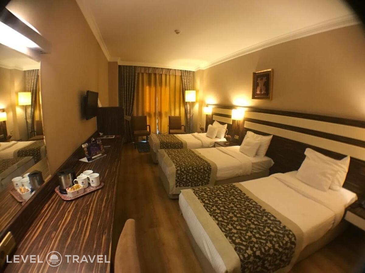 фотографии номера Трехместный номер отеля Akgun Hotel Beyazit в Турция(Фатих) - фото №2