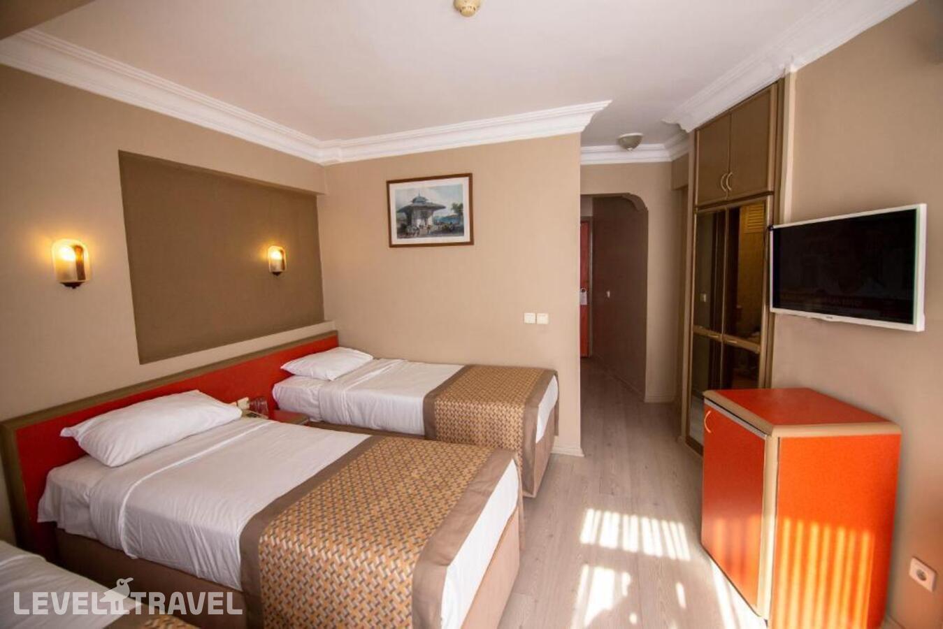 фотографии номера Трехместный номер отеля Sahinler Hotel в Турция(Фатих) - фото №3