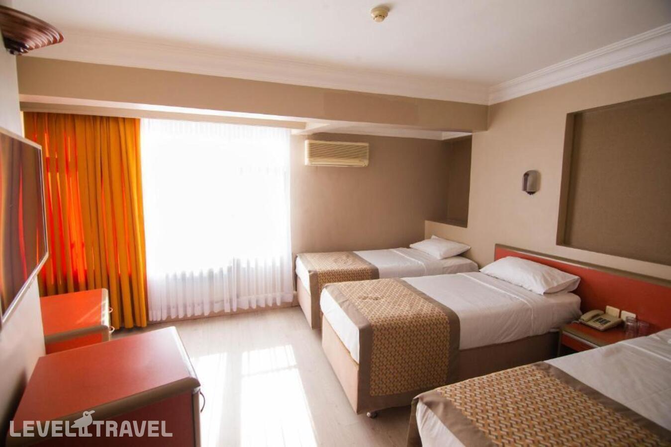 фотографии номера Трехместный номер отеля Sahinler Hotel в Турция(Фатих) - фото №1