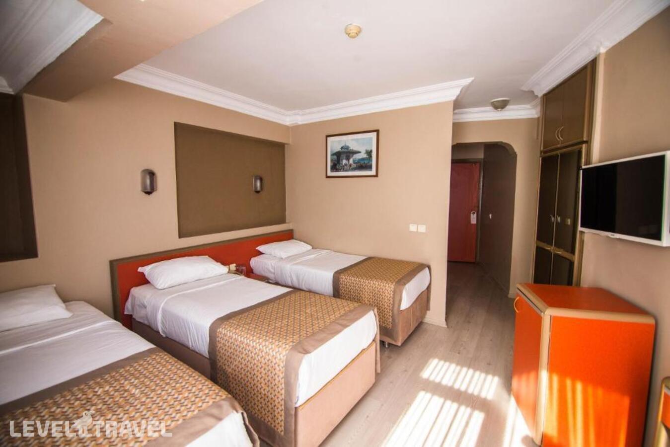 фотографии номера Трехместный номер отеля Sahinler Hotel в Турция(Фатих) - фото №4