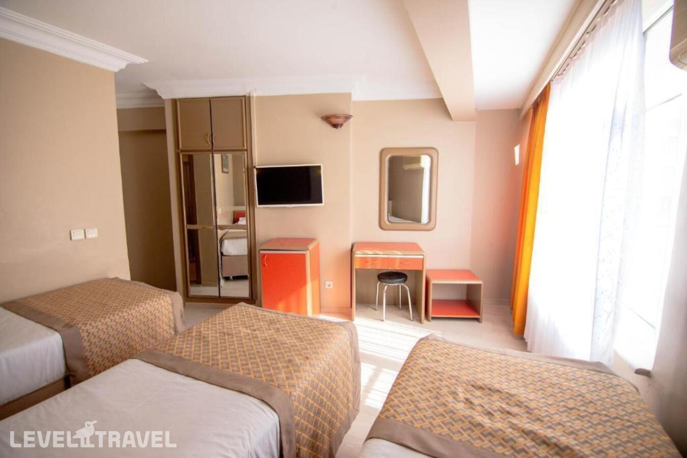 фотографии номера Трехместный номер отеля Sahinler Hotel в Турция(Фатих) - фото №2