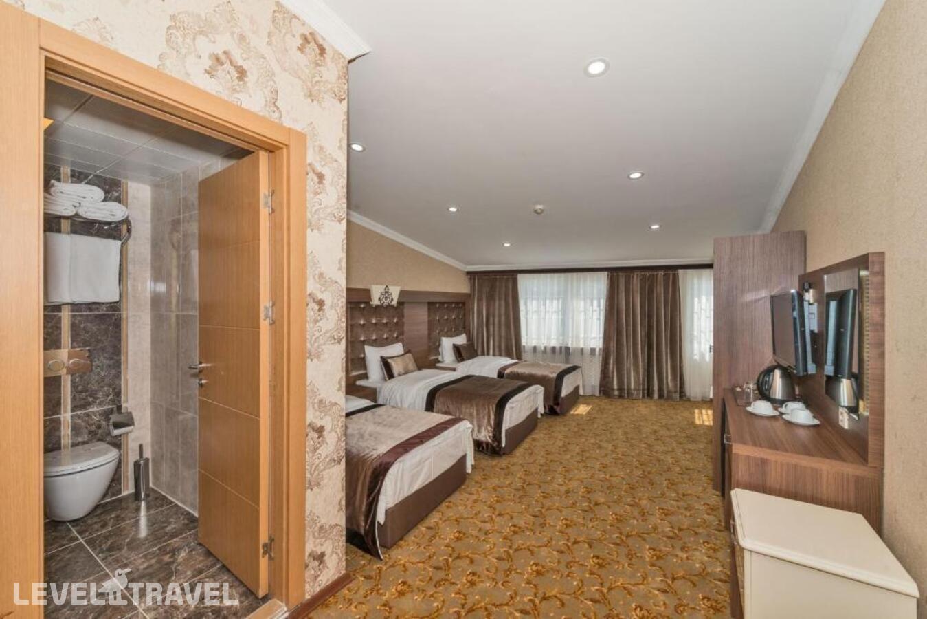 фотографии номера Четырехместный номер отеля Hera Montagna Hotel в Турция(Шишли) - фото №2