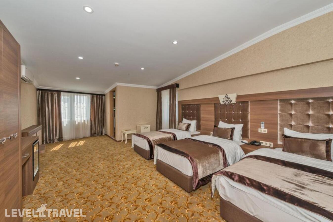 фотографии номера Четырехместный номер отеля Hera Montagna Hotel в Турция(Шишли) - фото №1