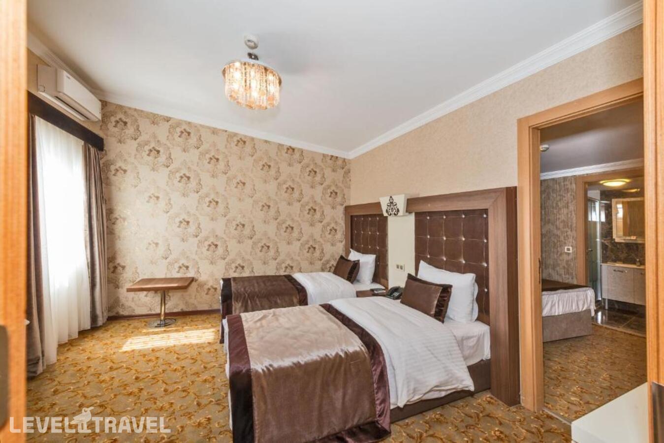 фотографии номера Четырехместный номер отеля Hera Montagna Hotel в Турция(Шишли) - фото №4