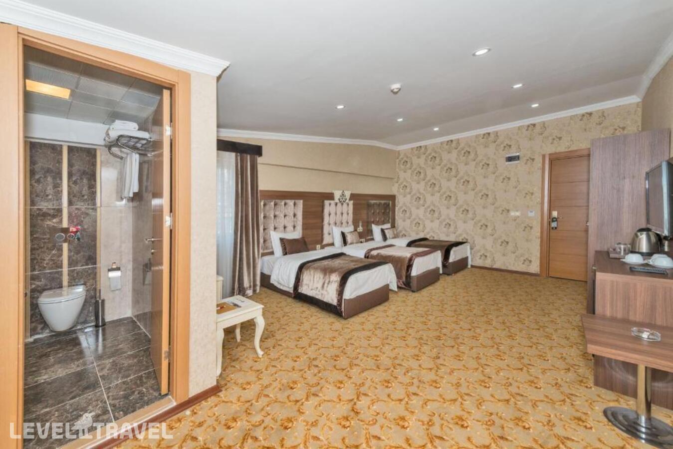 фотографии номера Четырехместный номер отеля Hera Montagna Hotel в Турция(Шишли) - фото №3