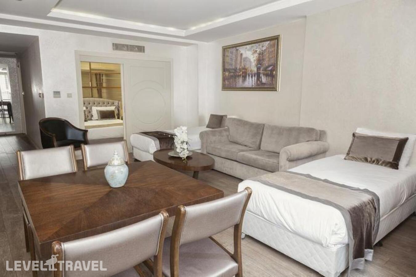 фотографии номера Семейный люкс отеля Orka Taksim Suites & Hotel (ex.Suiteness Taksim Hotel) в Турция(Бейоглу) - фото №1