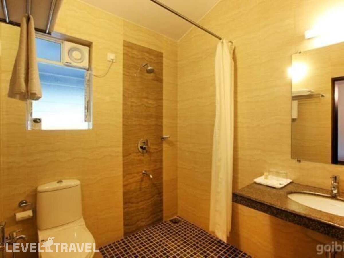 фотографии номера Стандартный номер отеля The Hawaii Comforts Hotel в Индия(Дона Паула) - фото №5
