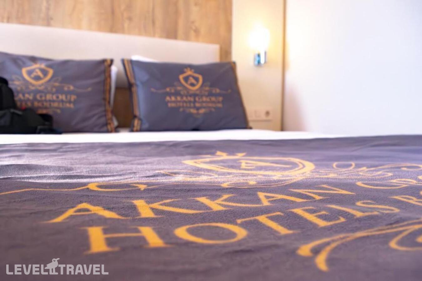 фотографии номера Семейный номер отеля Akkan Beach Hotel в Турция(Бодрум - центр) - фото №2