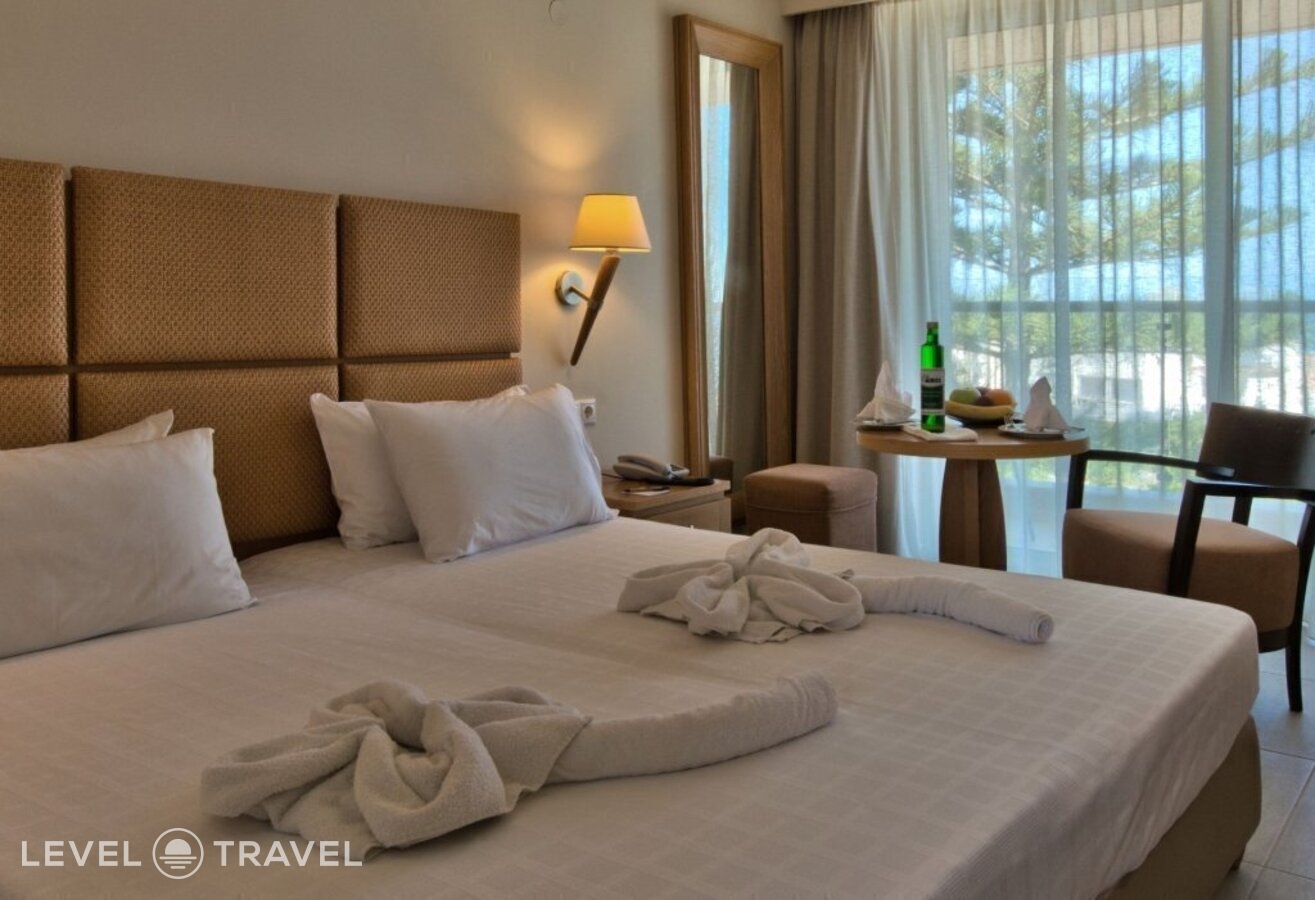 фотографии номера Делюкс отеля Minos Hotel в Греция(Ретимно) - фото №5