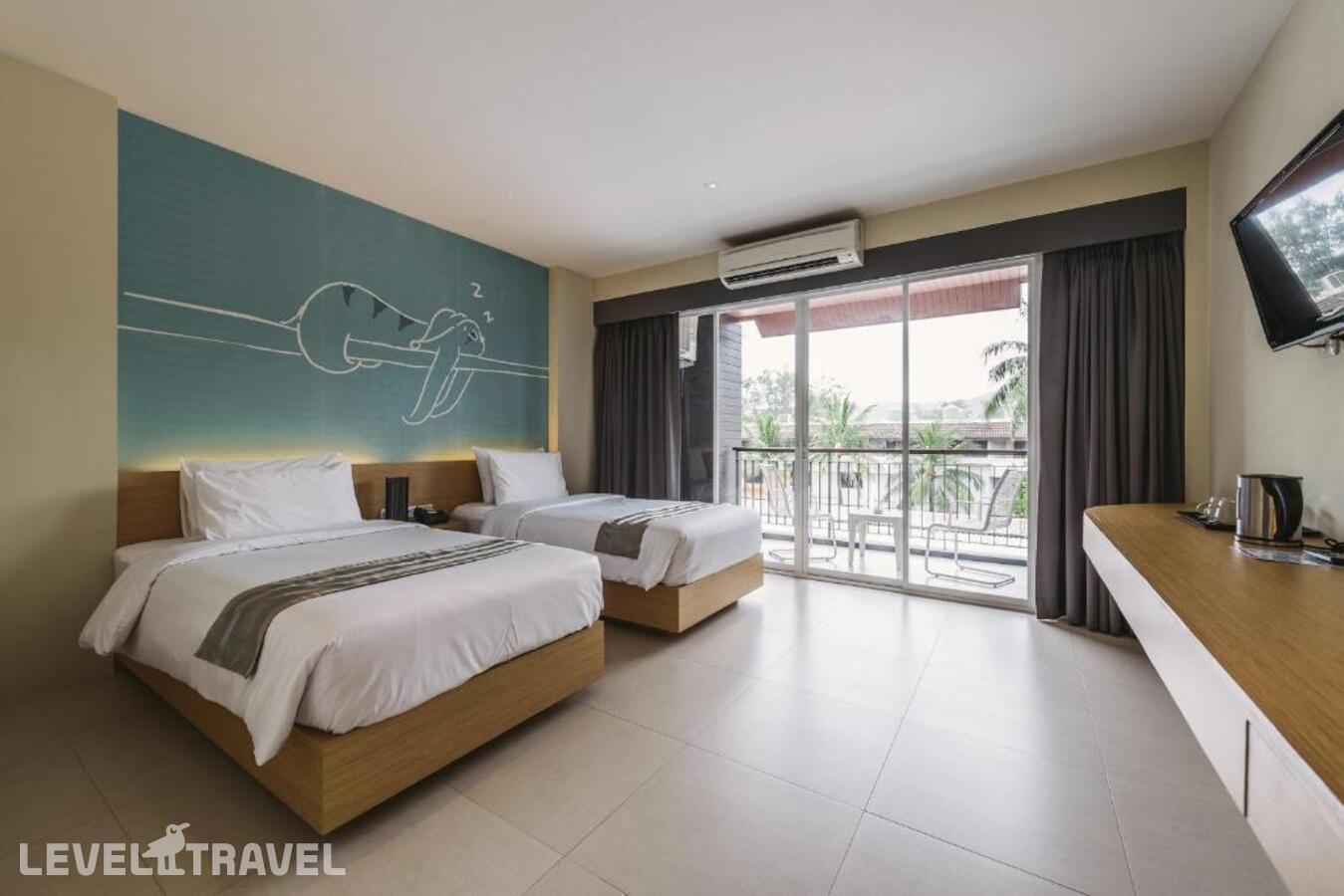 фотографии номера Делюкс отеля Tiras Patong Beach Hotel в Таиланд(Патонг Бич) - фото №1