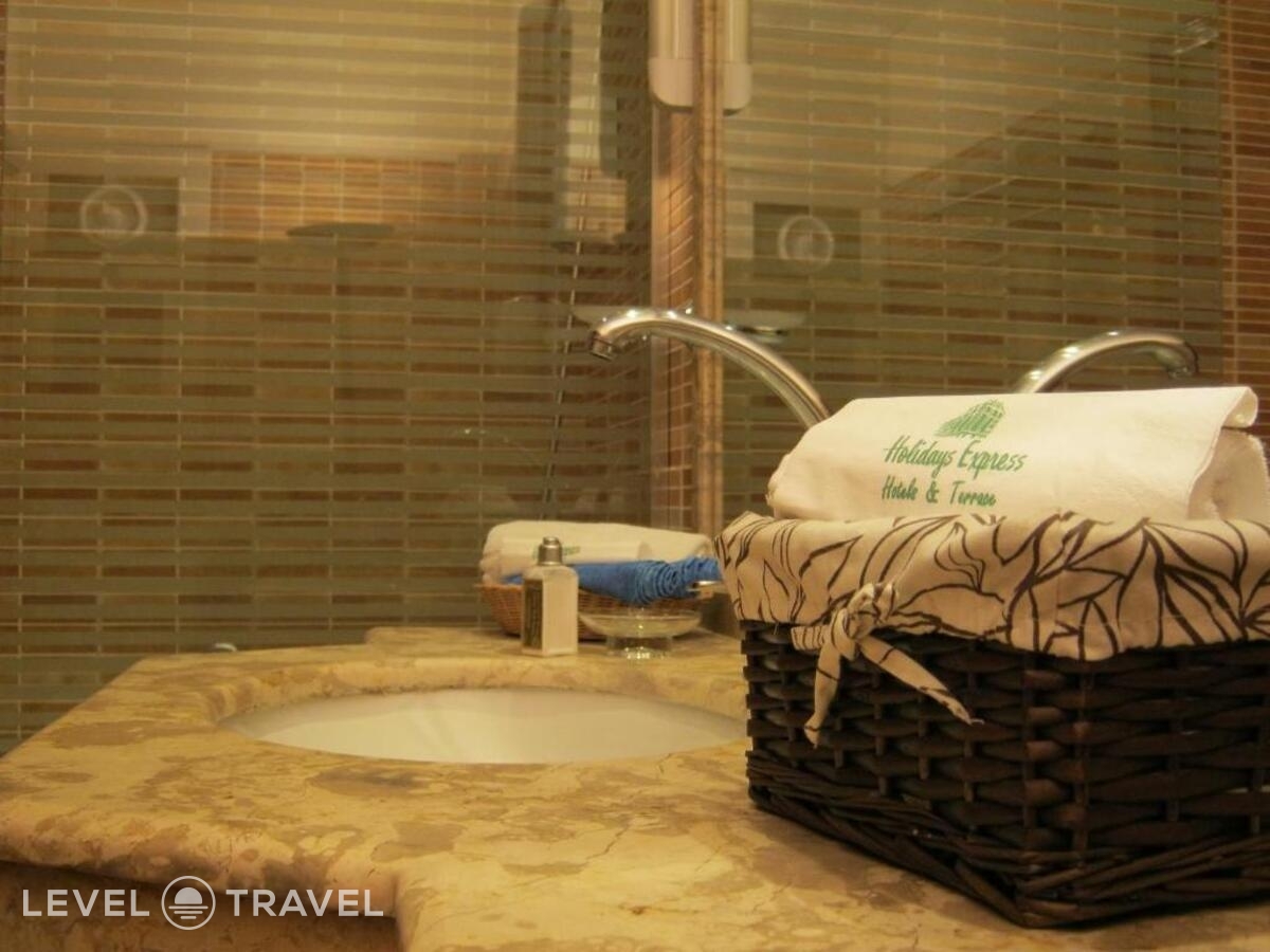 фотографии номера Трехместный улучшенный отеля Holidays Express Hotel в Египет(Гиза) - фото №2