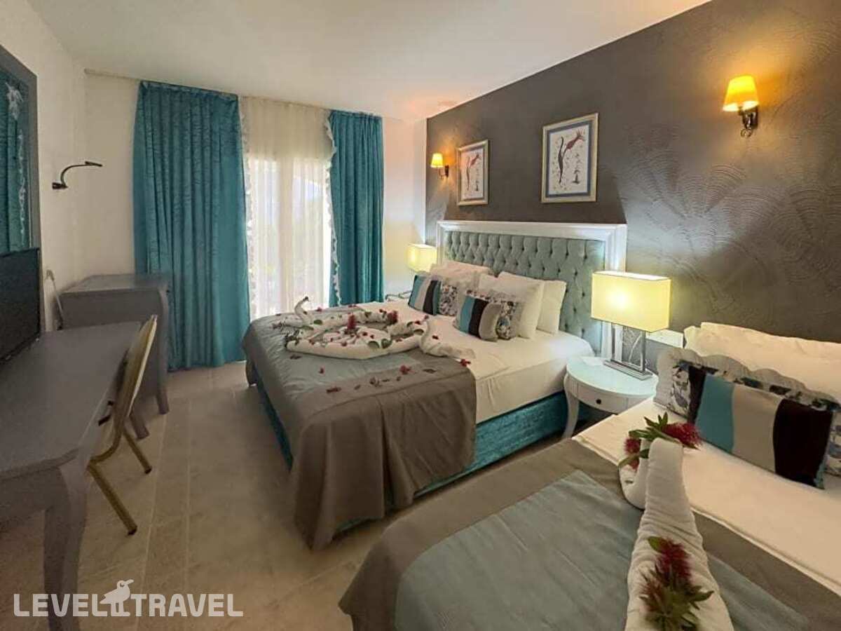 фотографии номера Одноместный номер отеля Tiana Beach Hotel в Турция(Кадикале) - фото №7