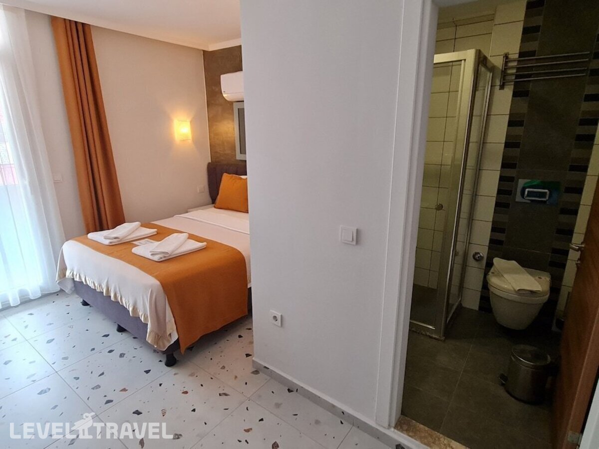 фотографии номера Одноместный Комфорт отеля Tonoz Beach Hotel в Турция(Олюдениз) - фото №3