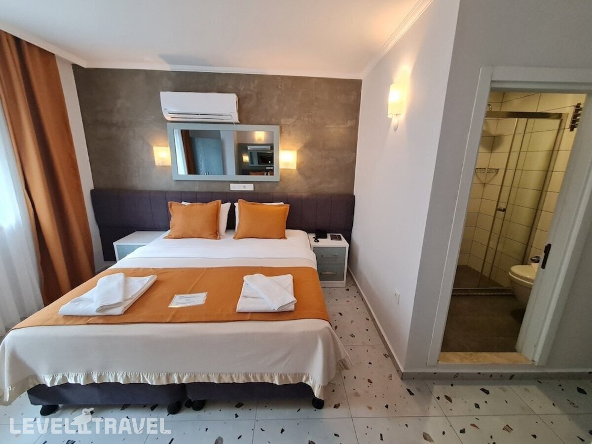 фотографии номера Одноместный Комфорт отеля Tonoz Beach Hotel в Турция(Олюдениз) - фото №4
