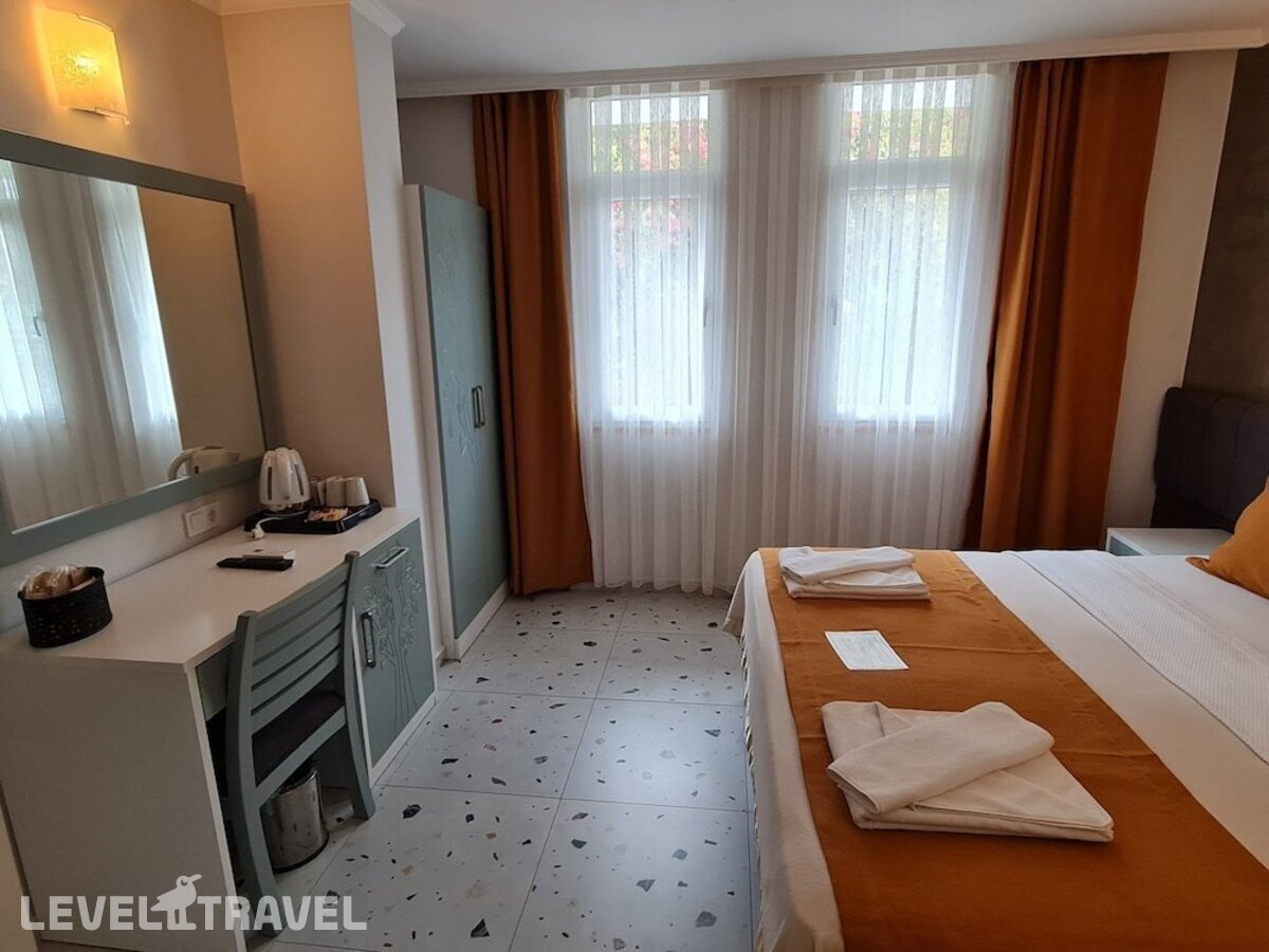 фотографии номера Одноместный Комфорт отеля Tonoz Beach Hotel в Турция(Олюдениз) - фото №2