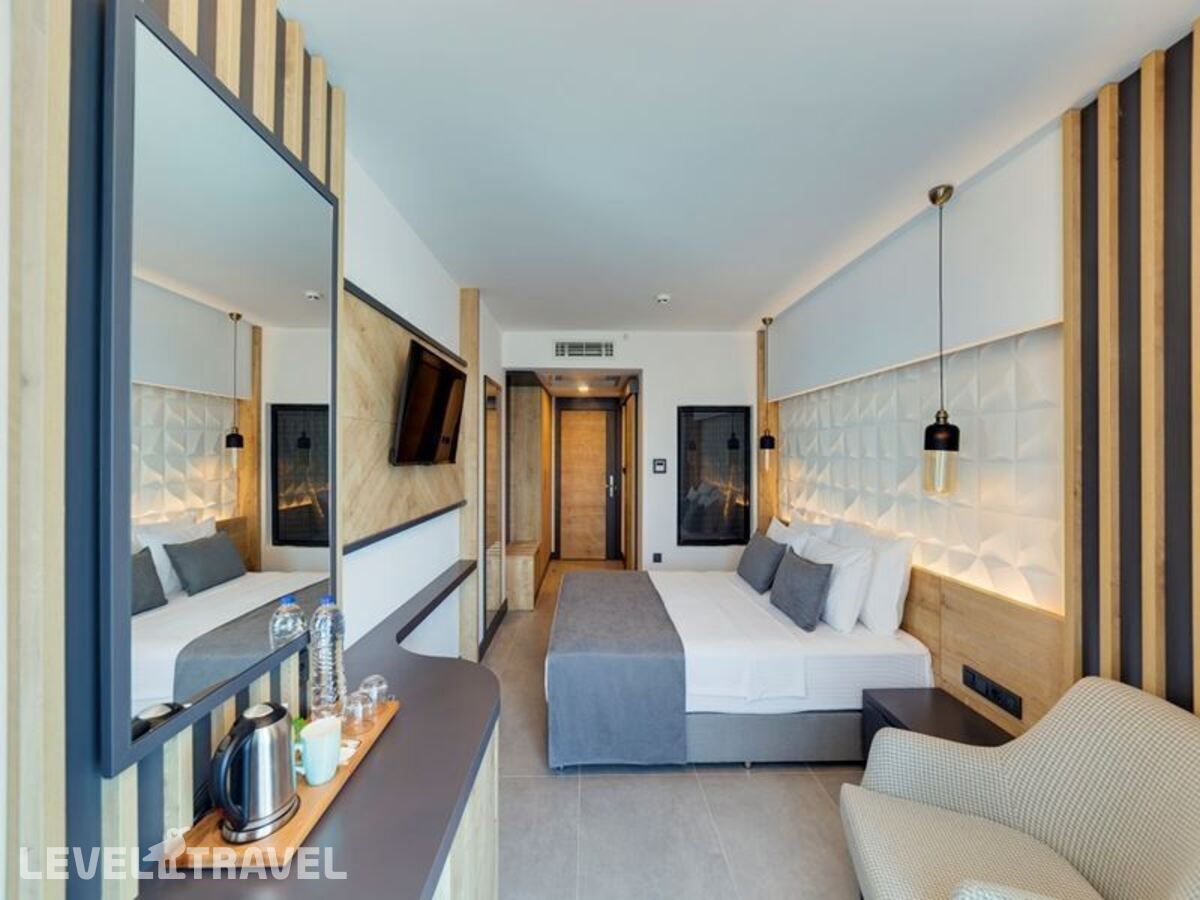 фотографии номера Промо номер с балконом отеля Signature Blue Resort Kusadasi в Турция(Кушадасы) - фото №2