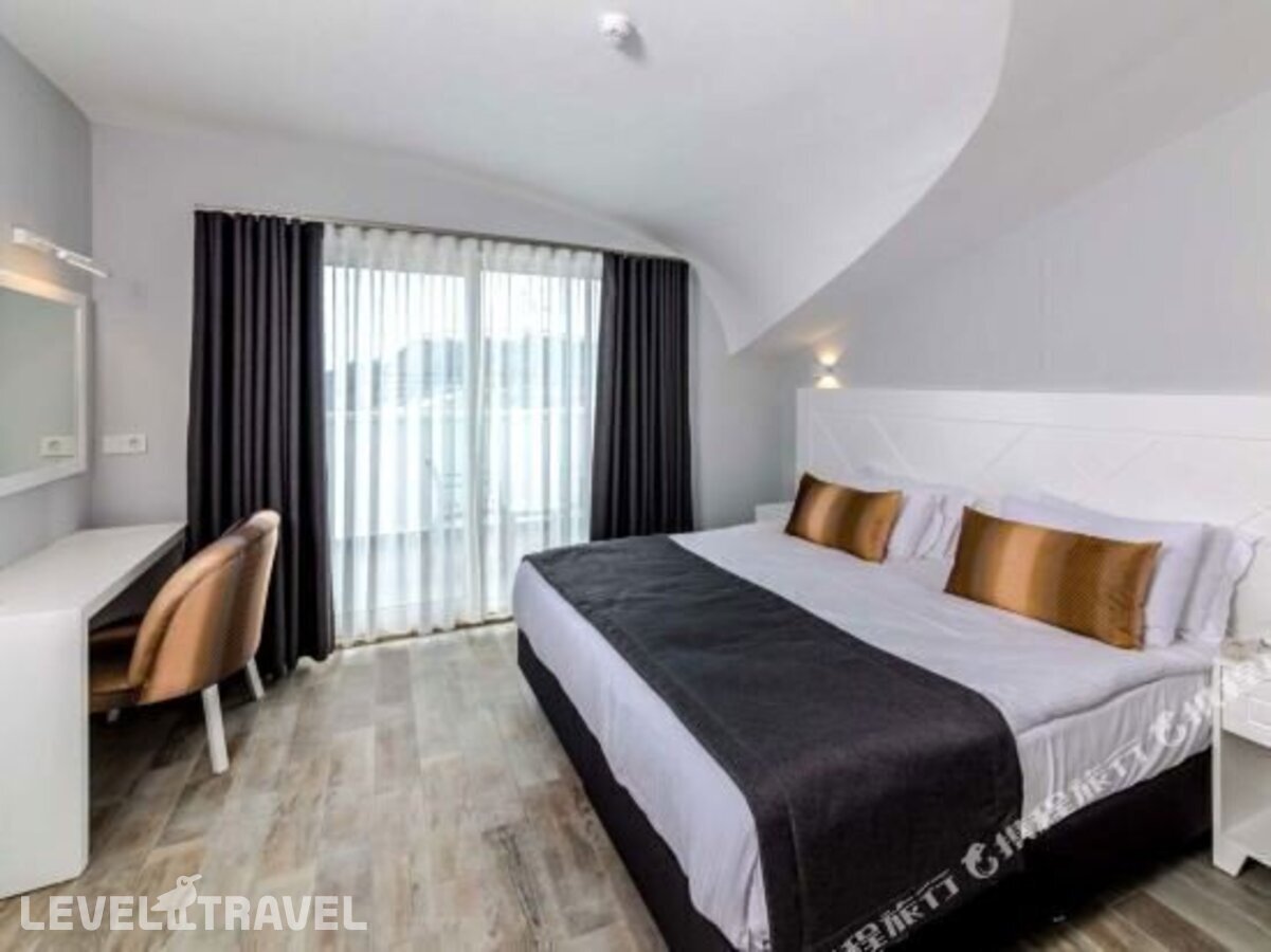 фотографии номера Семейный номер отеля Motto Premium Marmaris (Ex. Orka Nergis Select, Ex. Noa Nergis Select) в Турция(Мармарис - центр) - фото №10