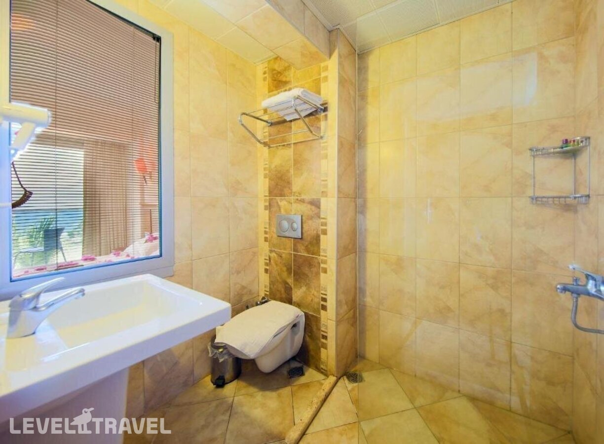 фотографии номера Семейный номер отеля Moda Beach Hotel в Турция(Мармарис - центр) - фото №2