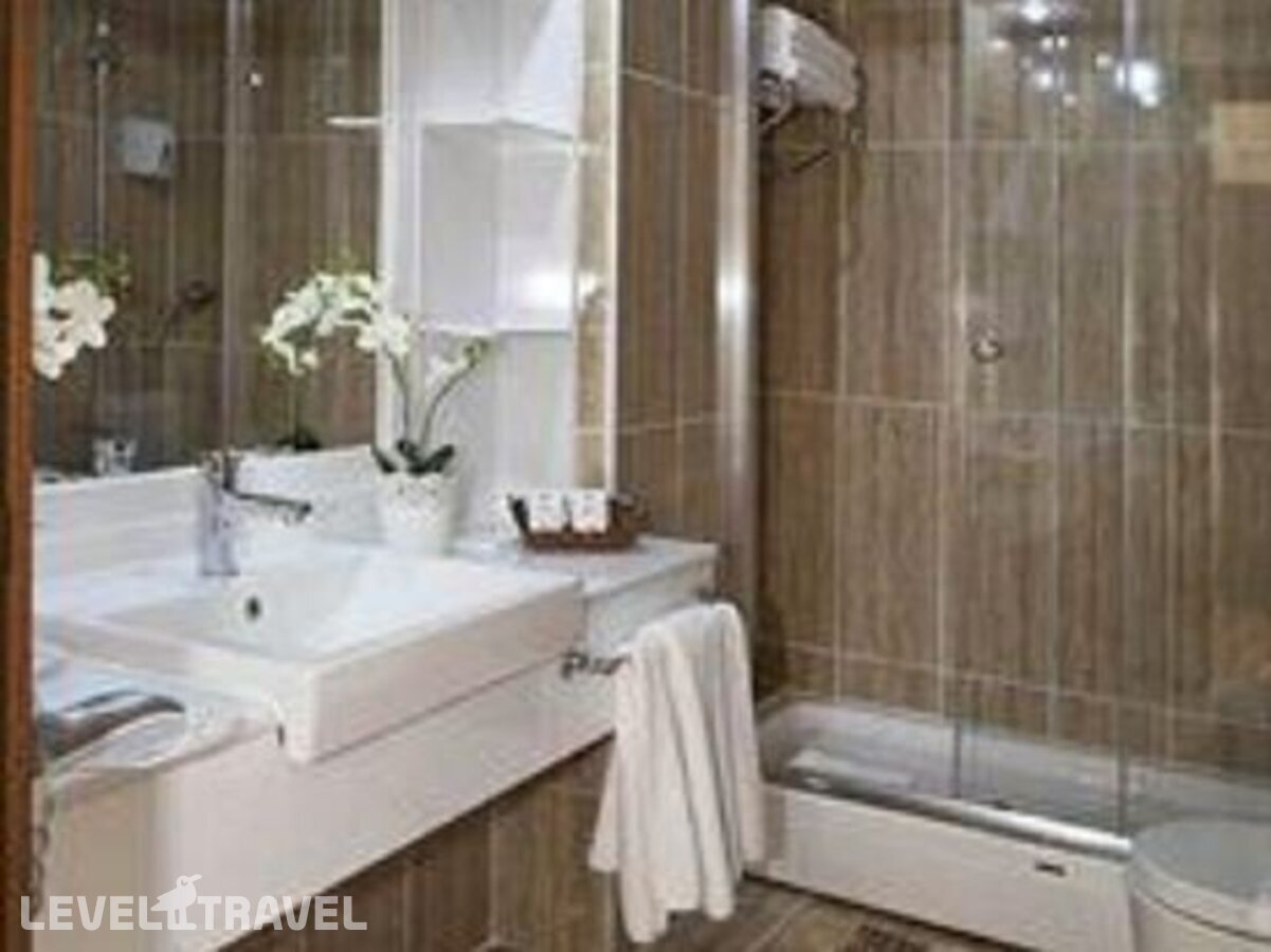 фотографии номера Семейный номер отеля Buyuk Sahinler Hotel в Турция(Фатих) - фото №24
