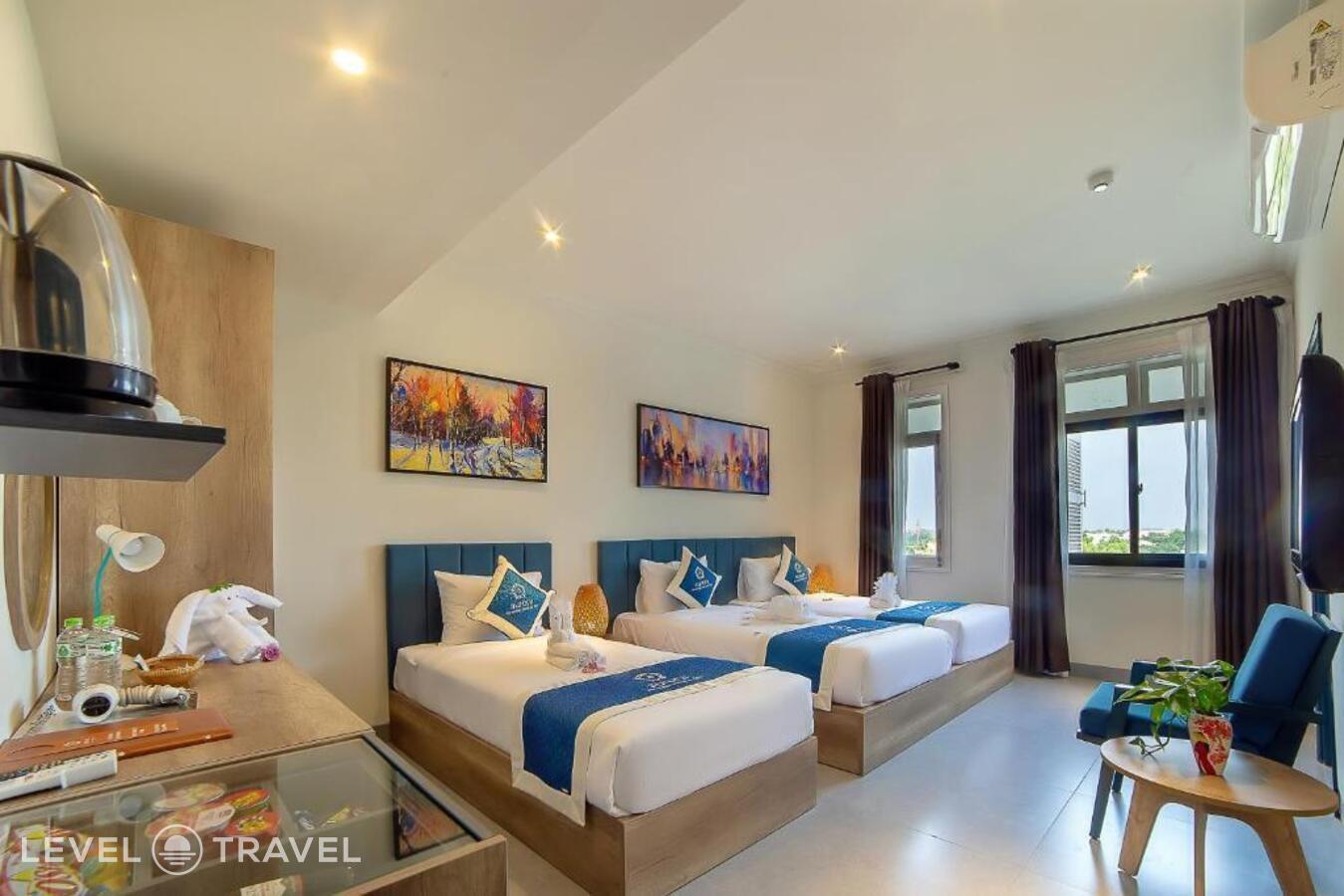 фотографии номера Трехместный улучшенный отеля Aurora Riverside Hotel (Ex. Phuoc An River Hotel) в Вьетнам(Хойан) - фото №6