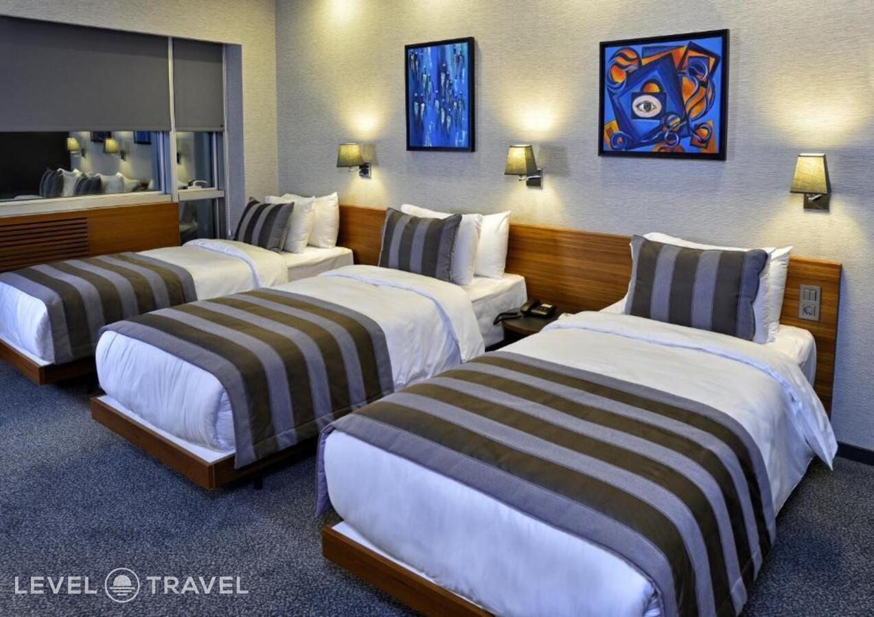 фотографии номера Трехместный номер отеля Modus Hotel Nisantasi в Турция(Шишли) - фото №2