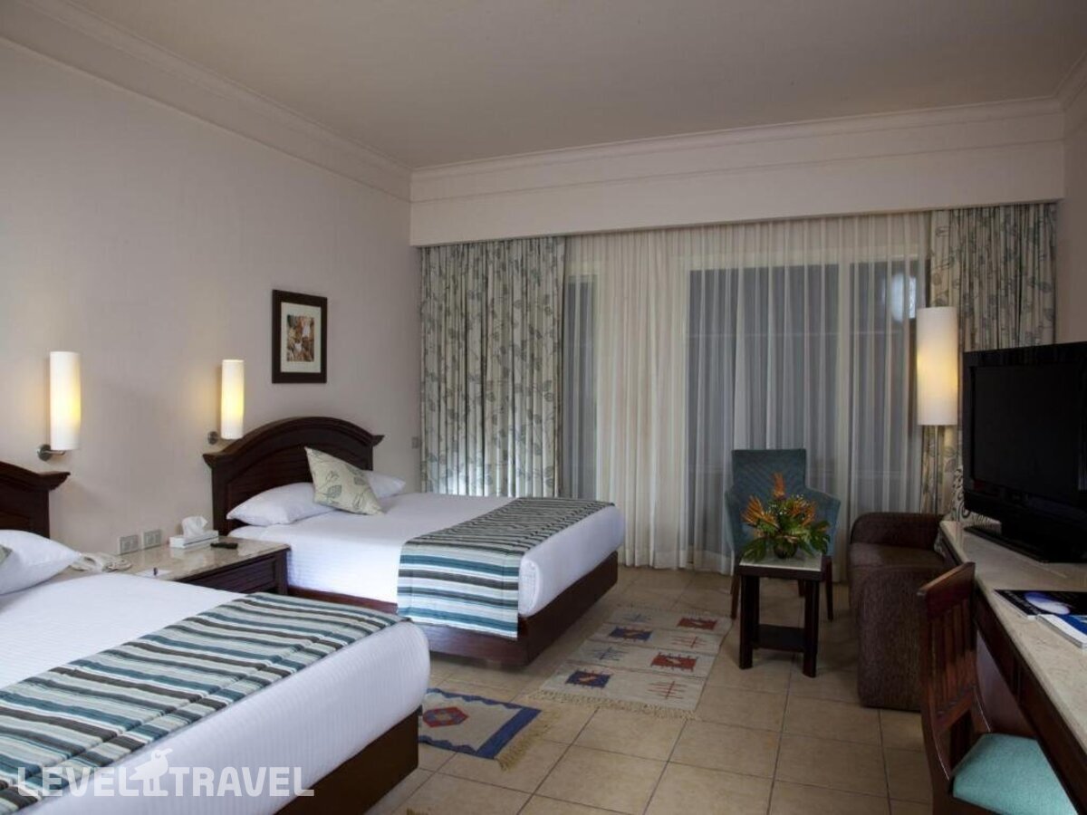 фотографии номера Стандартный с видом на сад отеля Coral Beach Resort Hurghada By Sunrise (Ex. Coral Beach Rotana Resort) в Египет(Хургада (город)) - фото №1