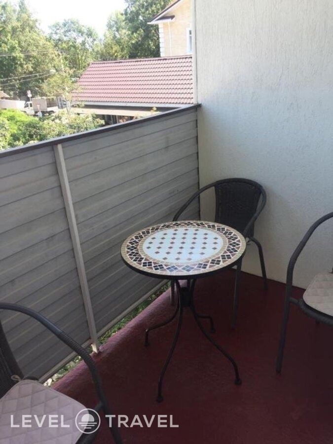 фотографии номера Четырехместный номер отеля Золотой Берег Гостевой Дом в Россия(Архипо-Осиповка) - фото №7