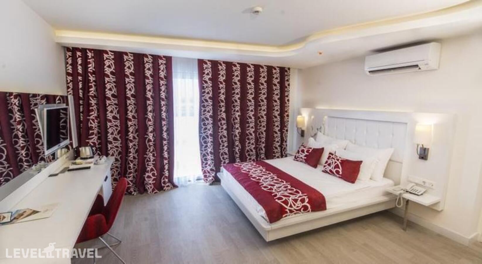 фотографии номера Одноместный номер отеля Laguna Beach Alya Resort & Spa в Турция(Окурджалар) - фото №3