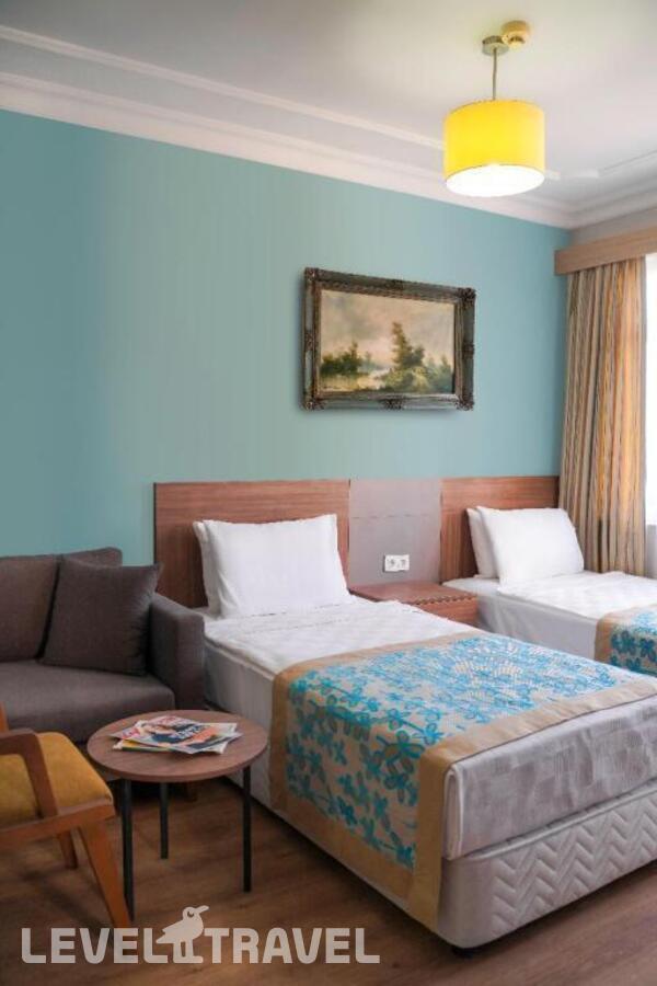 фотографии номера Семейный (2 комнаты) отеля Side Village Hotel в Турция(Кумкёй) - фото №1