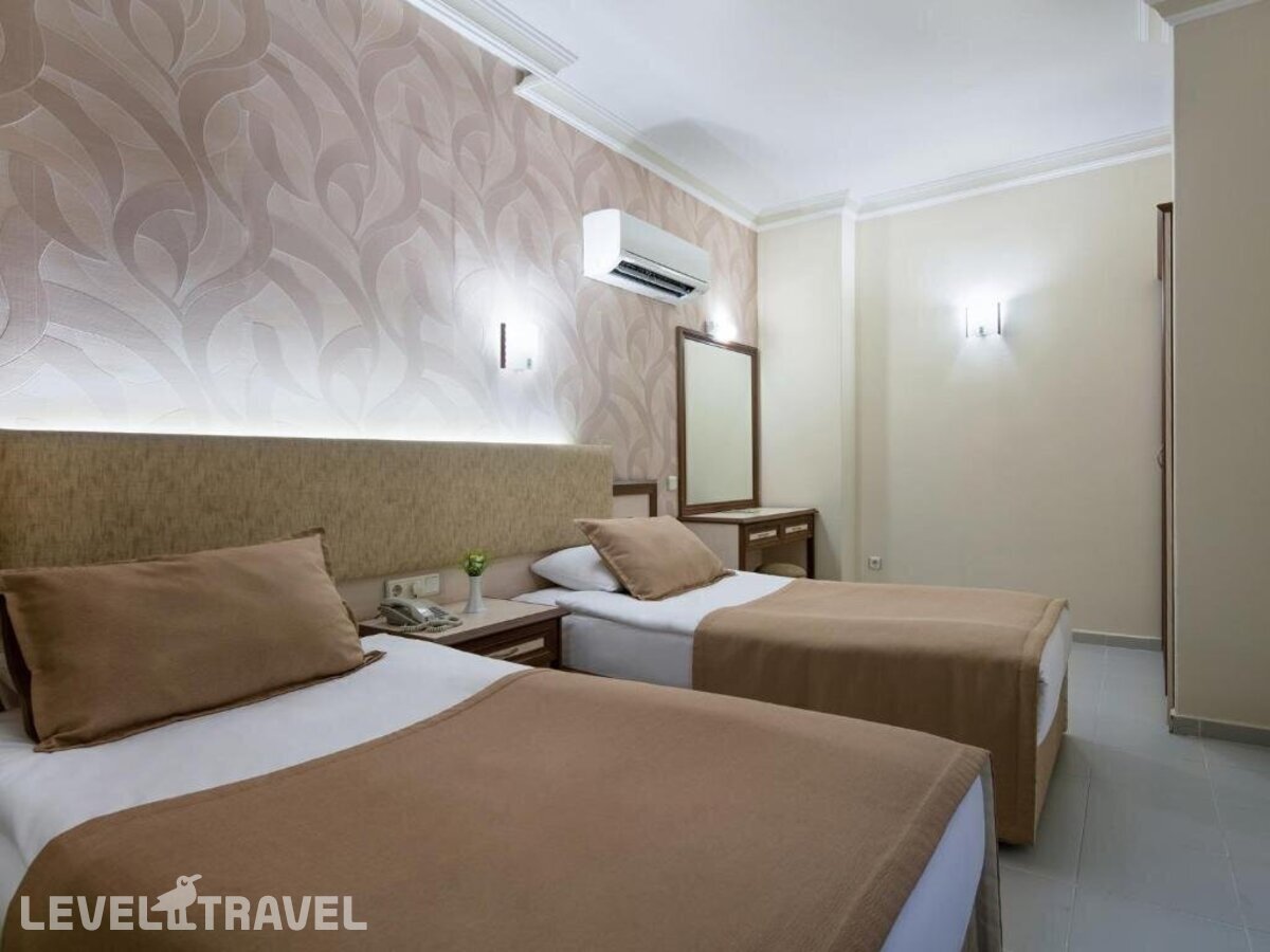 фотографии номера Четырехместные апартаменты отеля May Flower App Hotel в Турция(Аланья - центр) - фото №4