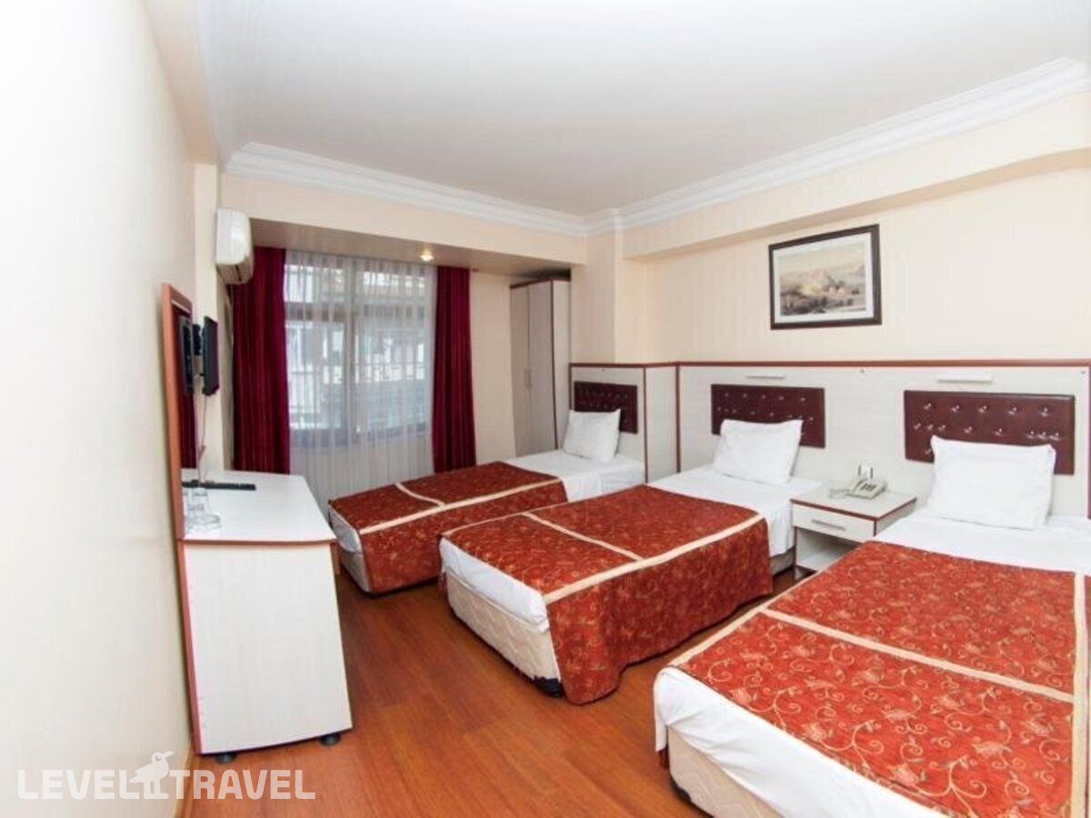 фотографии номера Семейный номер отеля Tayhan Hotel в Турция(Фатих) - фото №5