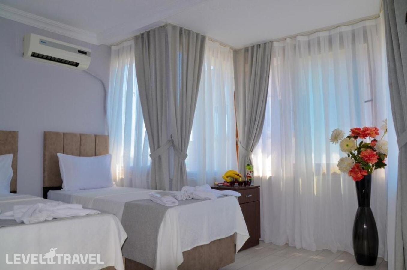 фотографии номера Трехместный номер отеля Yasmin Hotel в Турция(Фатих) - фото №4