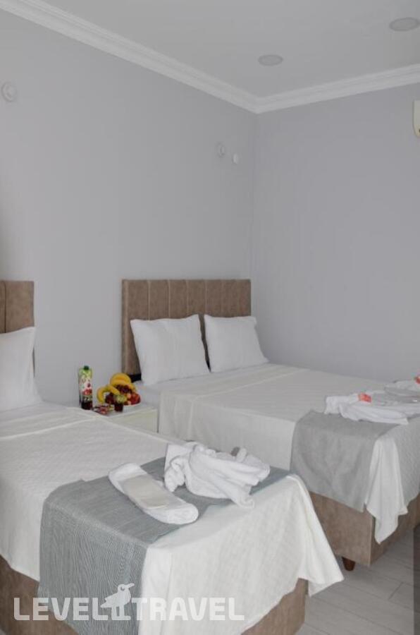 фотографии номера Трехместный номер отеля Yasmin Hotel в Турция(Фатих) - фото №3