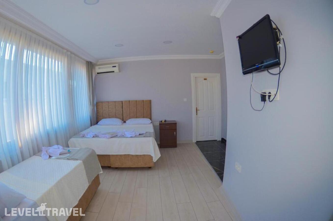 фотографии номера Трехместный номер отеля Yasmin Hotel в Турция(Фатих) - фото №9