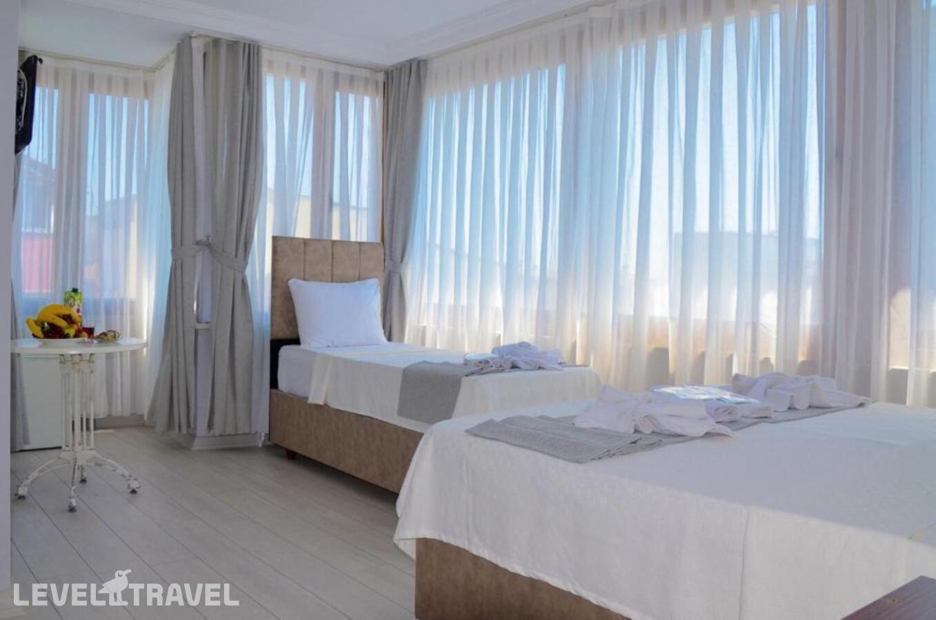 фотографии номера Трехместный номер отеля Yasmin Hotel в Турция(Фатих) - фото №5
